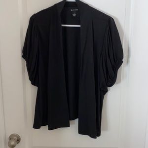 Black short sleeve cardigan.